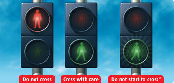 At traffic lights, puffin and pelican crossings\n\n	*At pelican crossings only